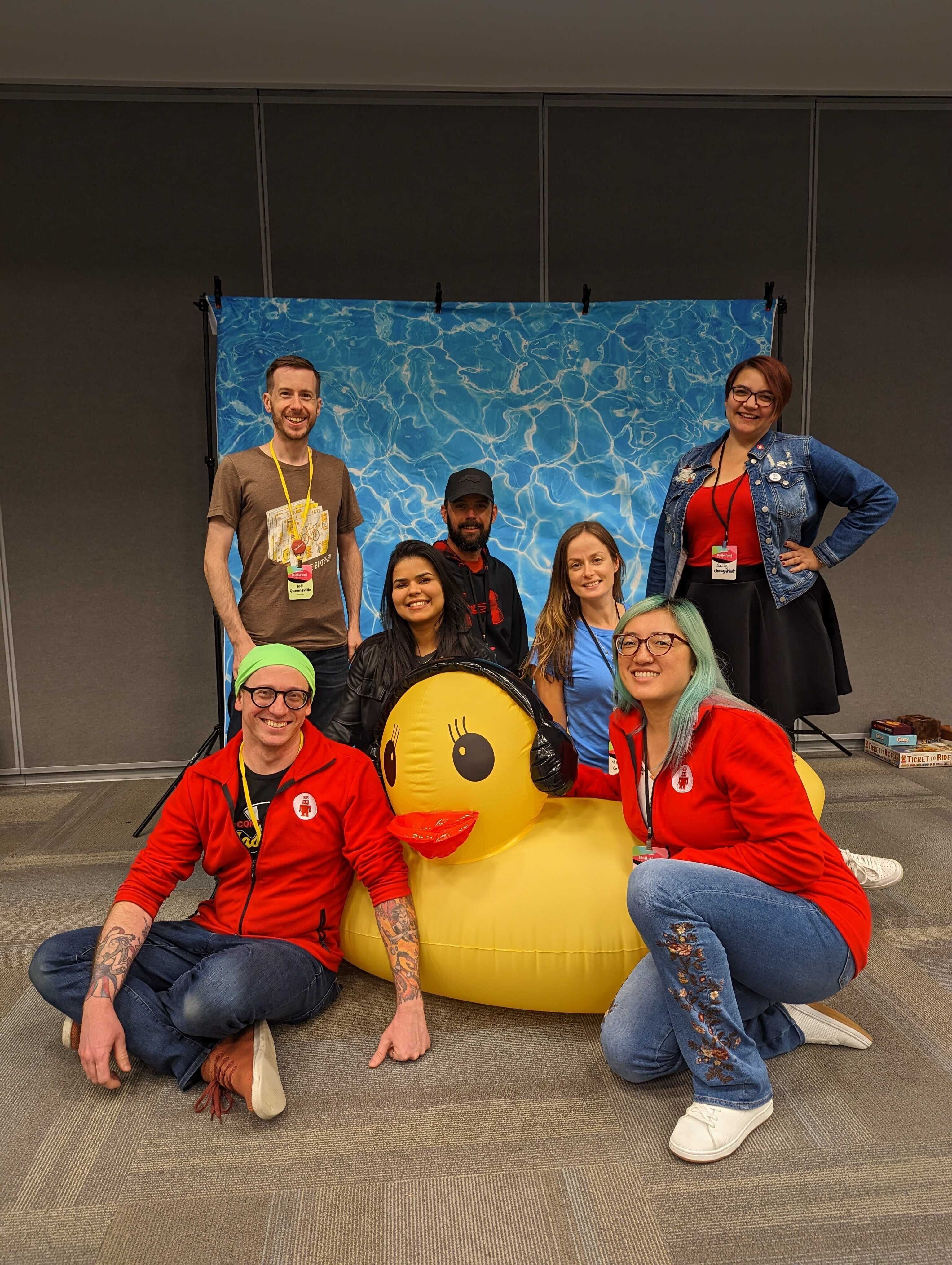 thoughtbot team sitting on a giant inflatable duck